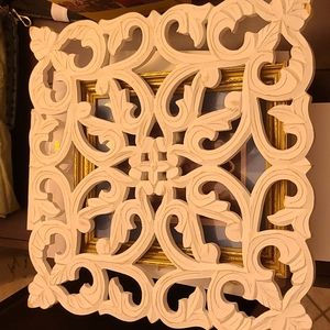 Wooden distressed scrolled art work